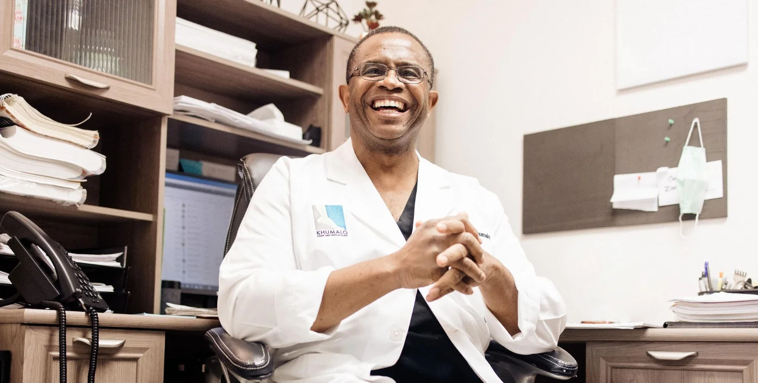 Image of Dr. Khumalo at his desk.